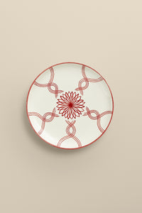Dessert plate with braided patterns