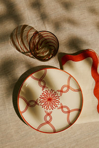 Dessert plate with braided patterns